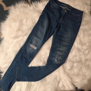 American Eagle Mid-Rise Distressed Jegging size 4